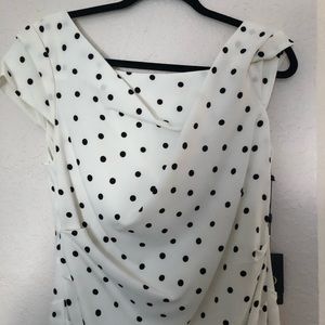 Dress with polka dots. Worn once for bridal shower. Tag has been removed.